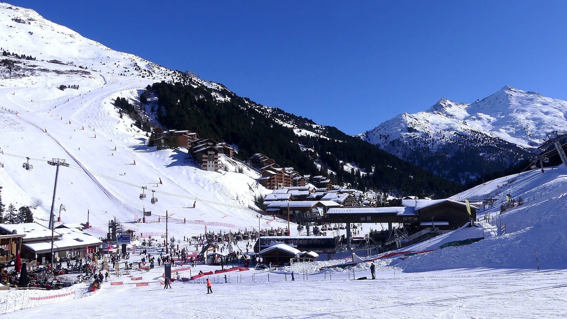 Méribel Mottaret village with ski slopes and lifts