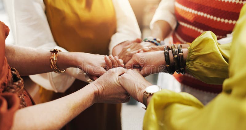 Church members in prayer, supporting the ministry through giving