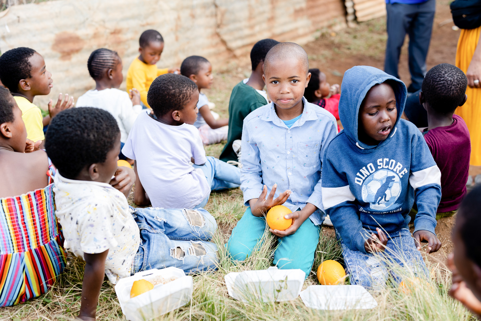 Happy African family benefiting from community development aid