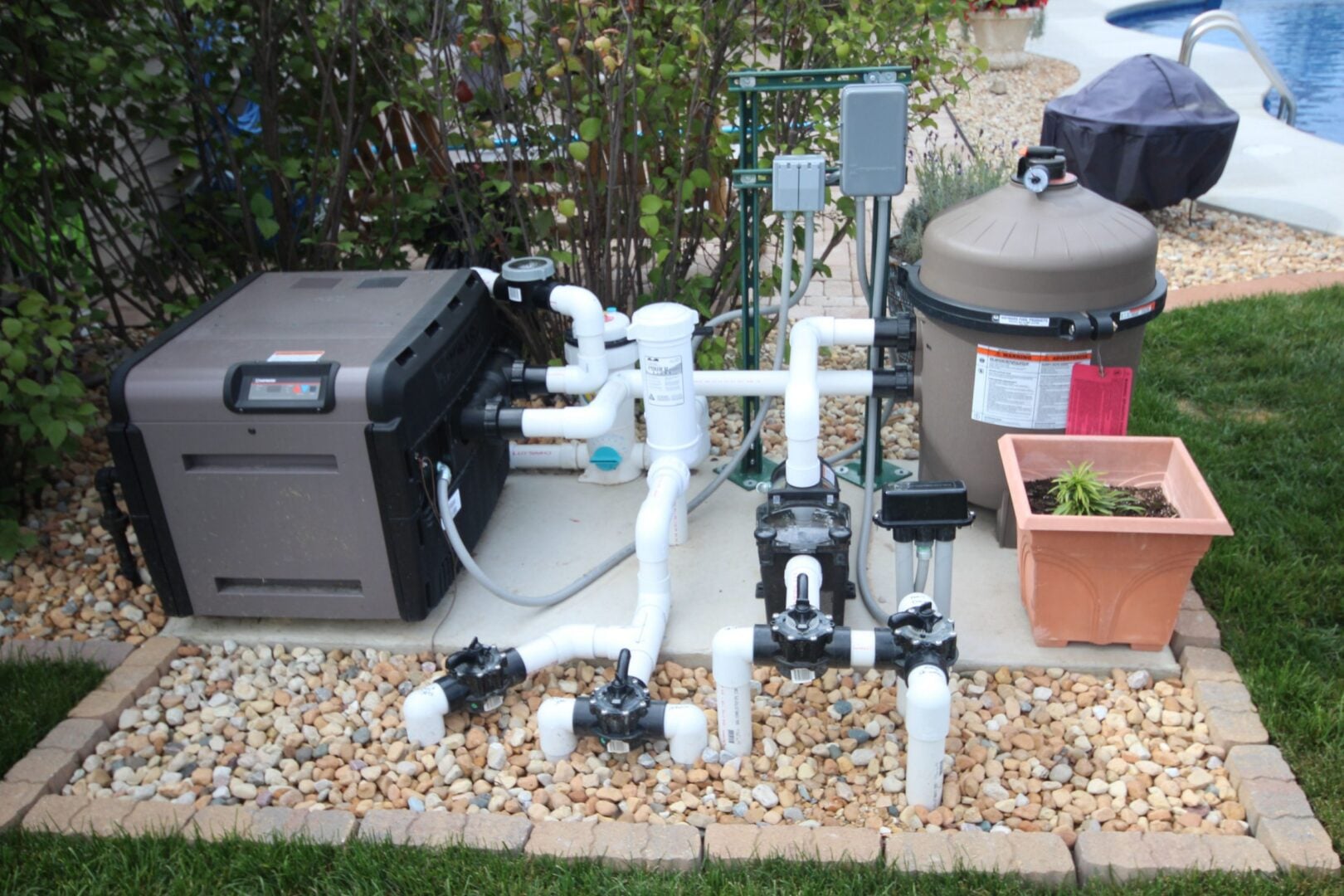 Pool pump and filter equipment system being professionally serviced