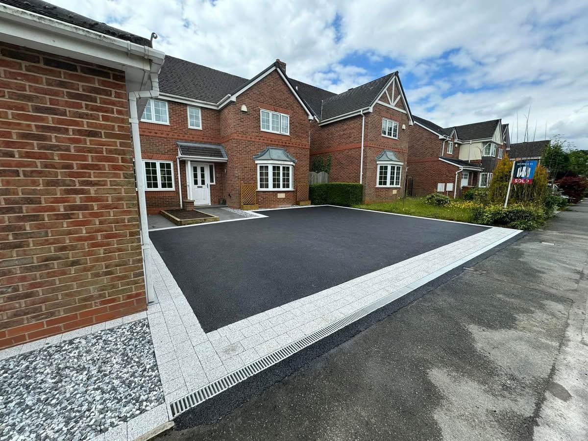 Freshly laid tarmac driveway