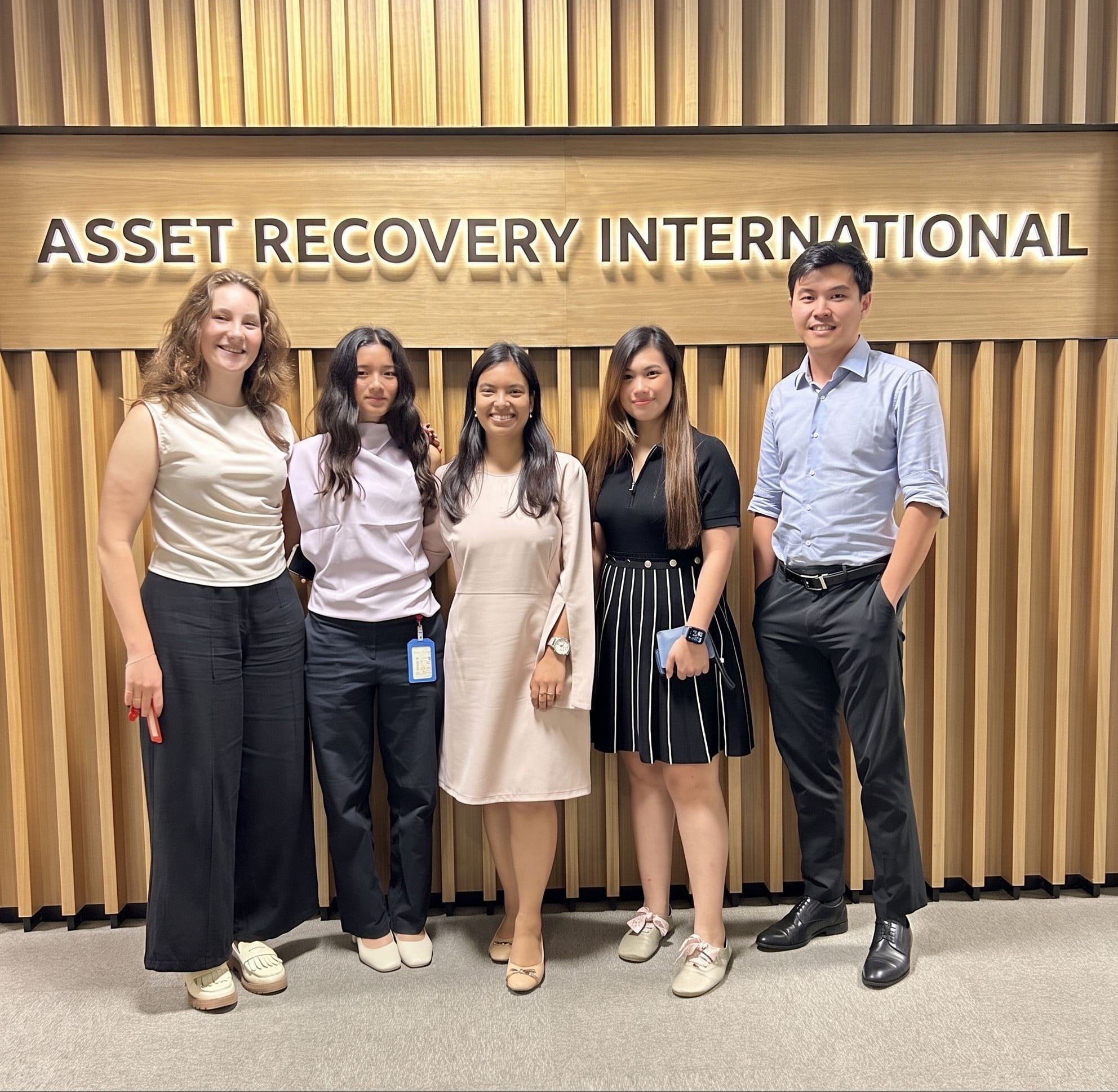 International Asset Recovery Group team in front of the office