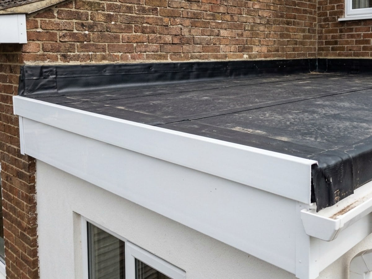 White fascia board and gutter on a house extension