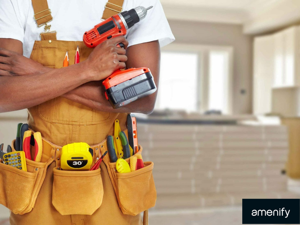 Professional handyman performing home maintenance repairs