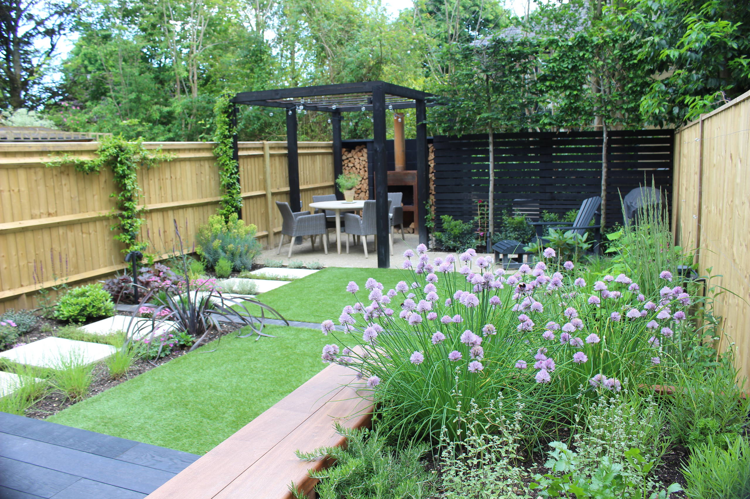 Completed garden transformation with patio and lawn in Hampshire
