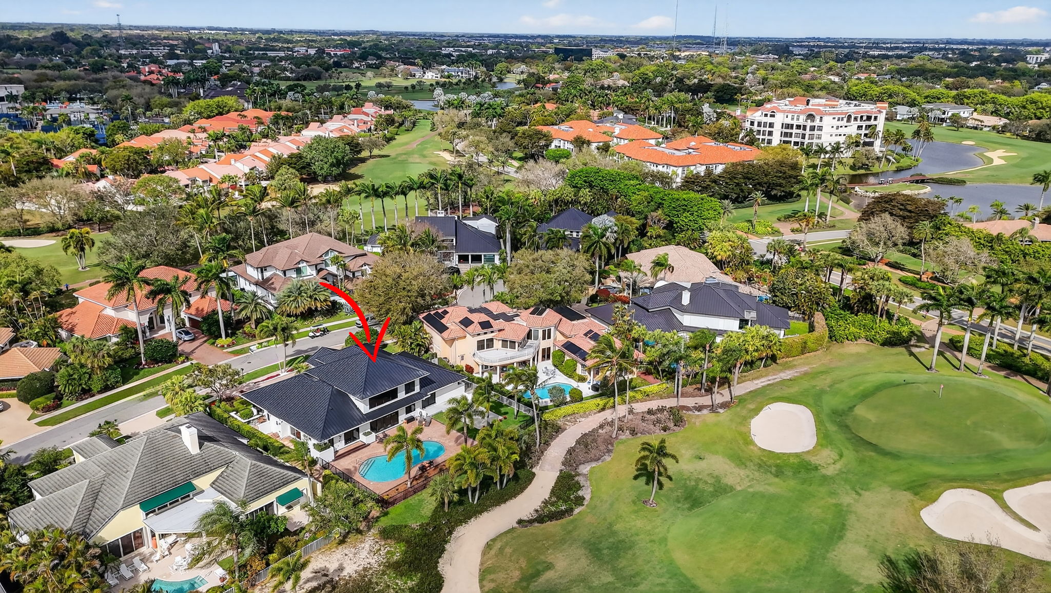 Drone view of home and golf course