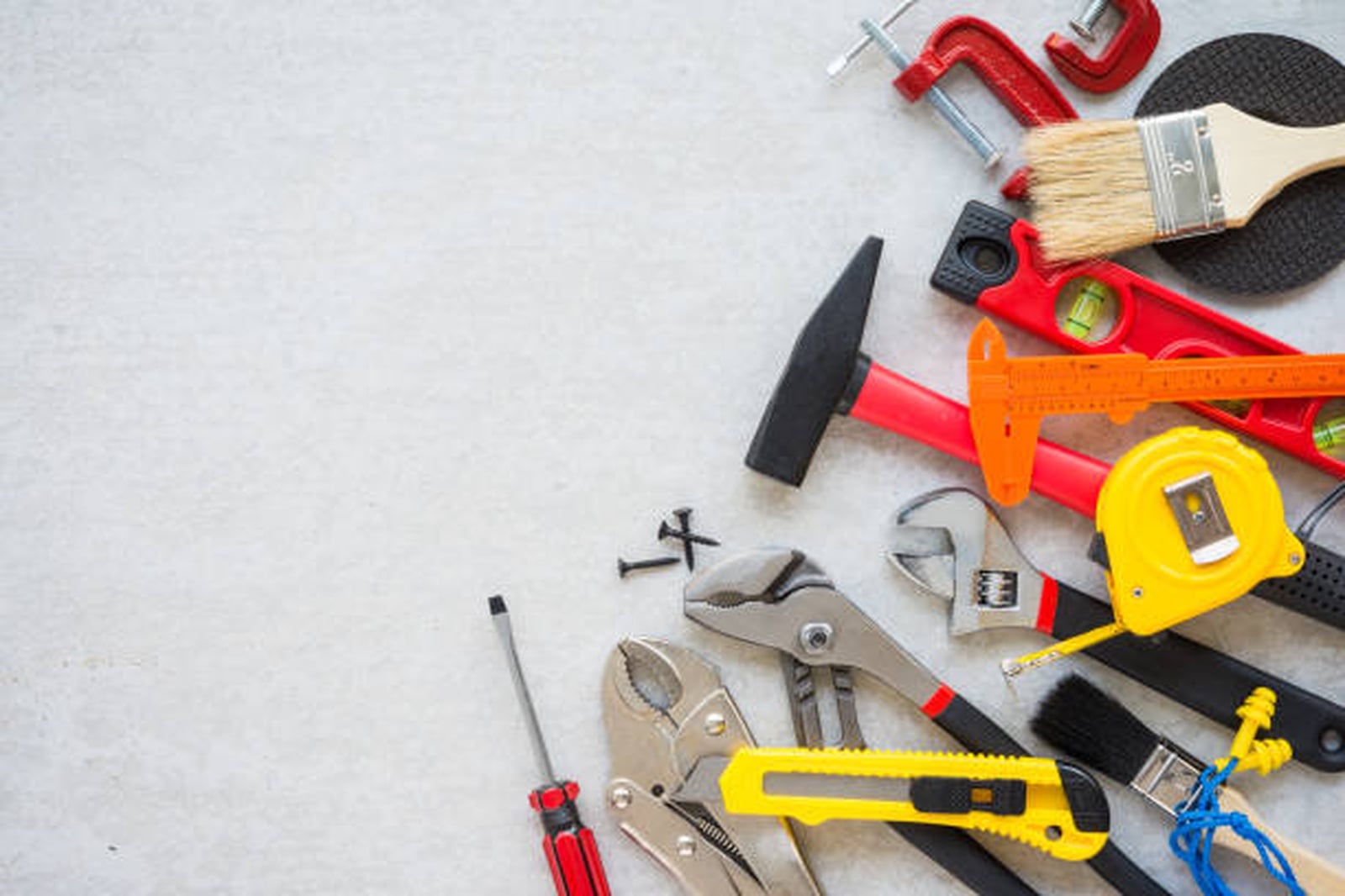 Professional handyman tools neatly arranged for home repair services