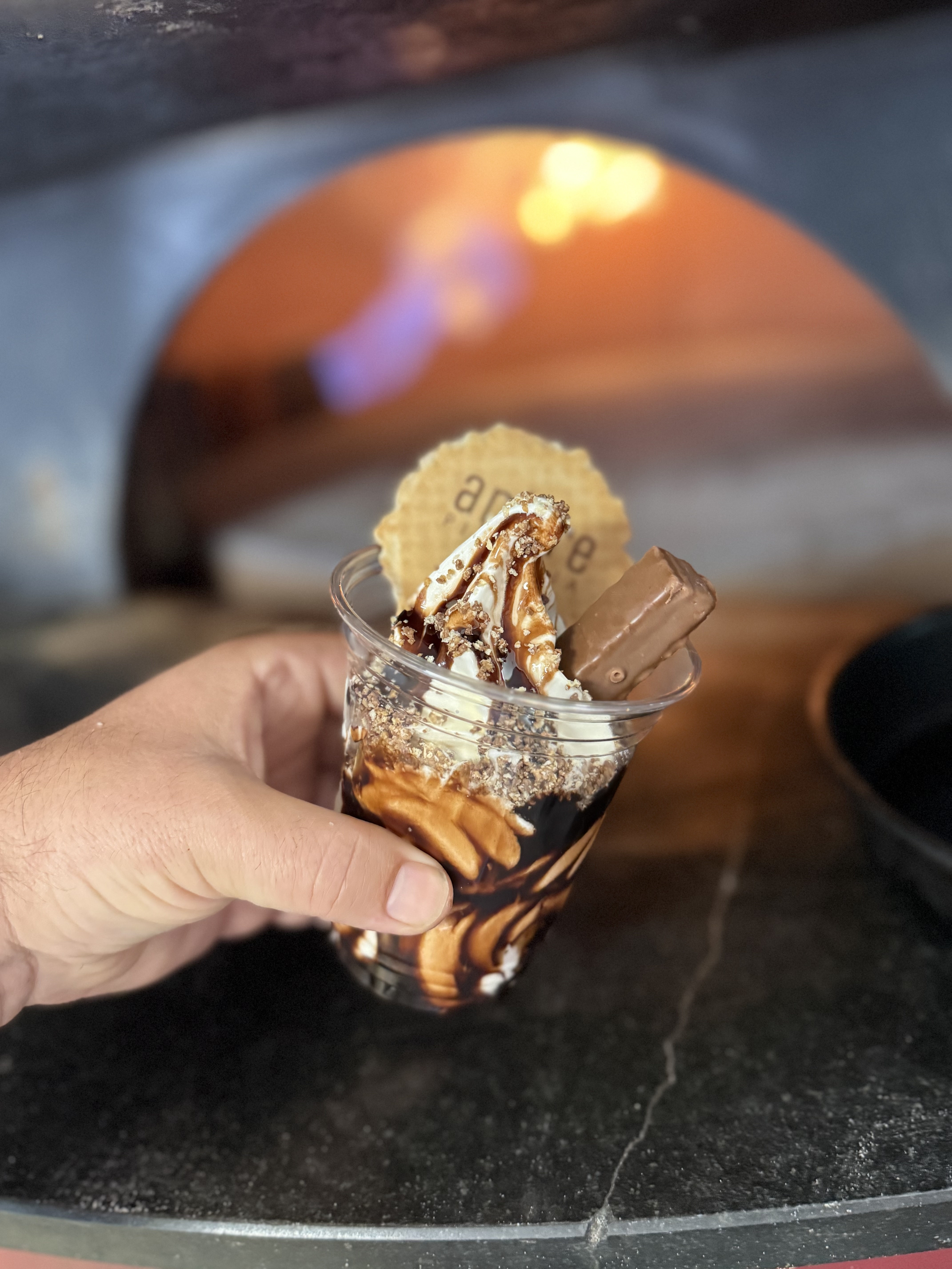 Amore Desserts sundae with chocolate sauce and toppings