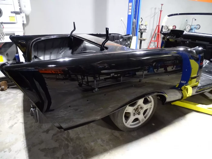 Black luxury car after full body restoration