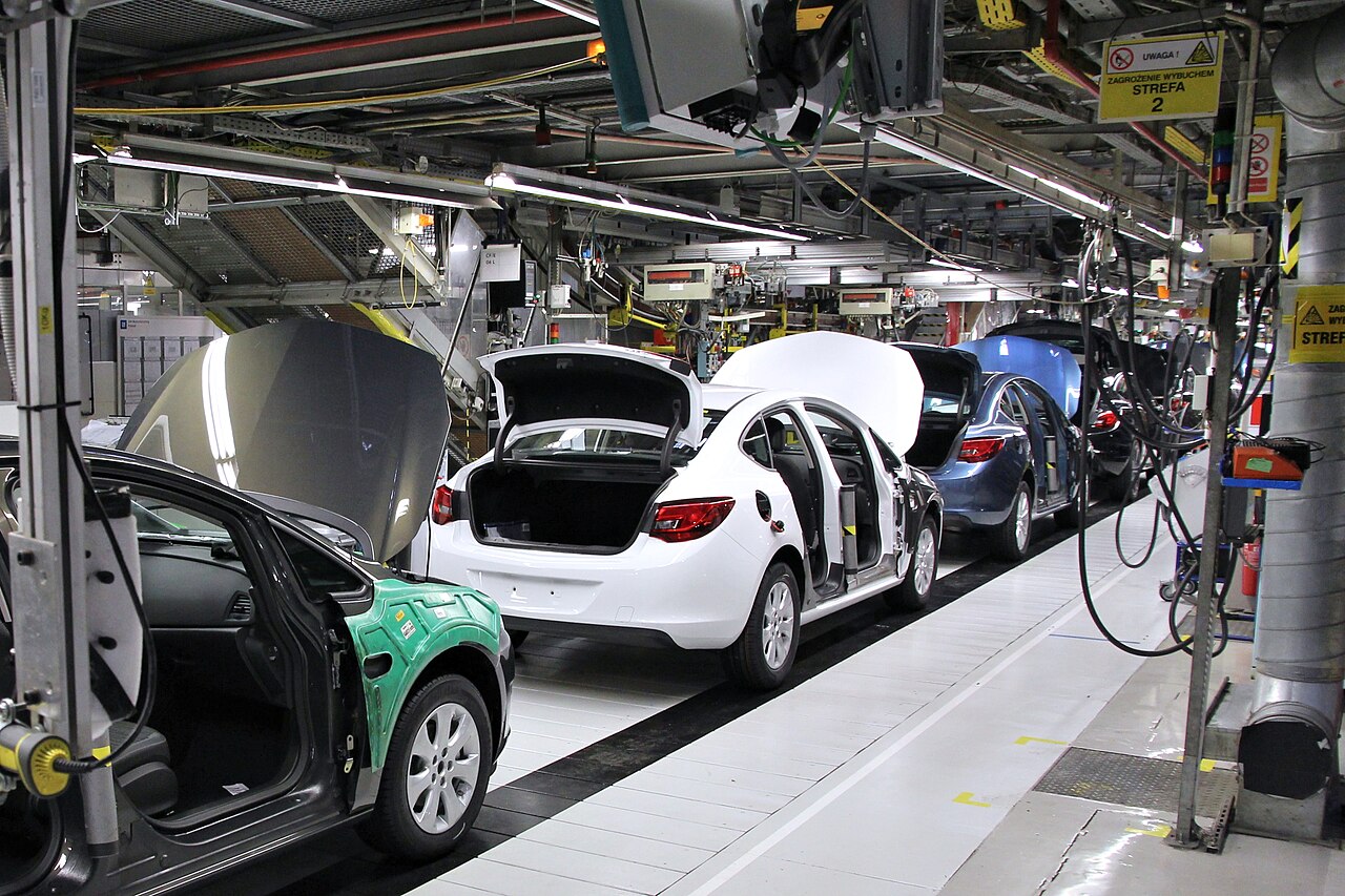 Automotive assembly line manufacturing with precision robotics
