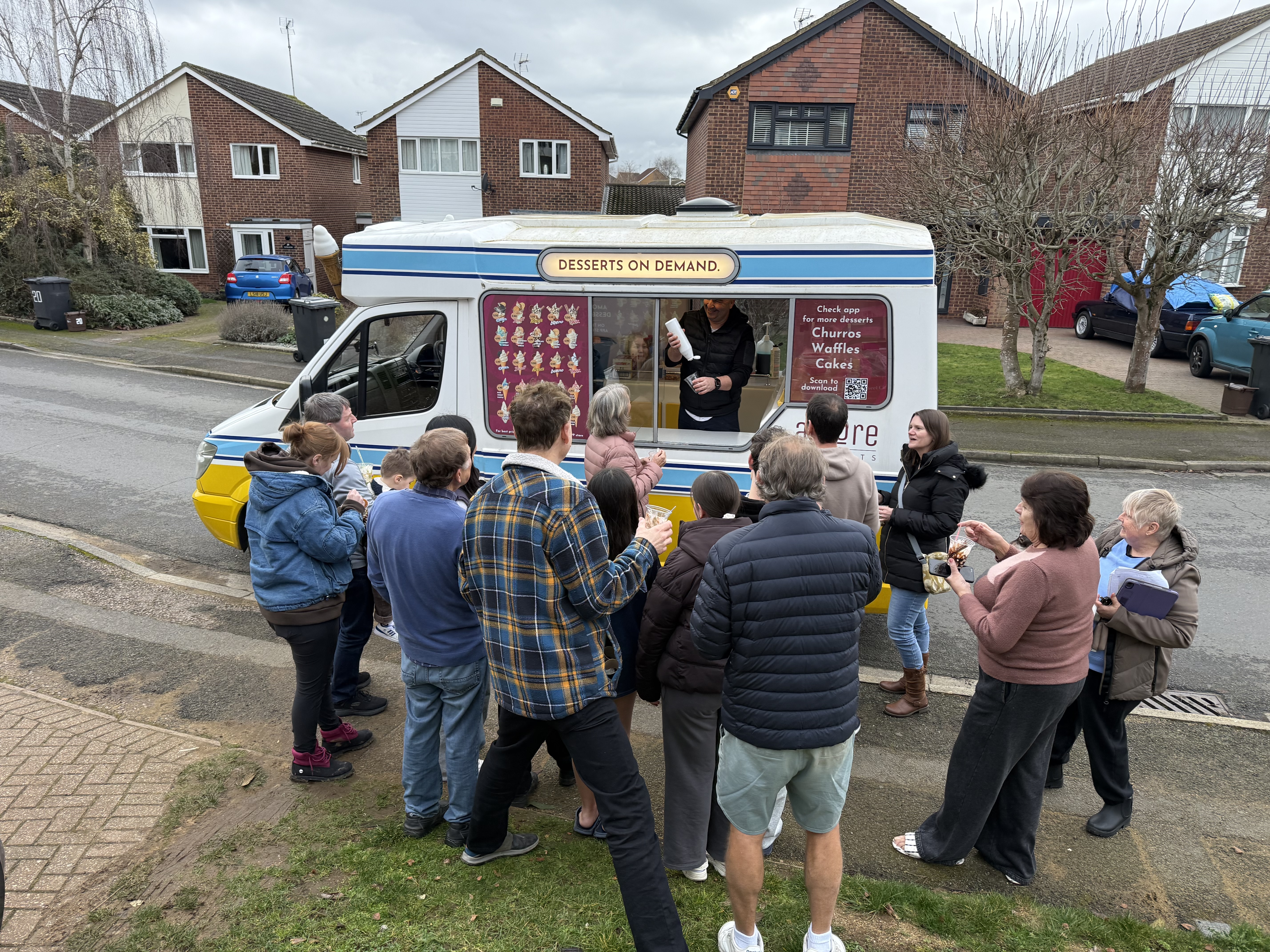 Amore Desserts ice cream van serving a crowd in Leighton Buzzard
