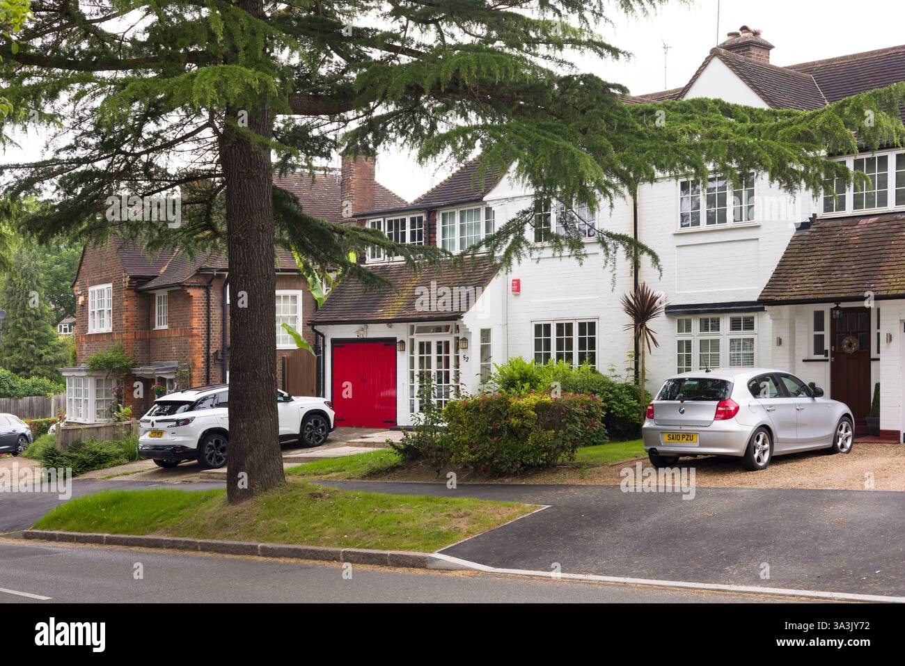 Driveway with car parked on block paving