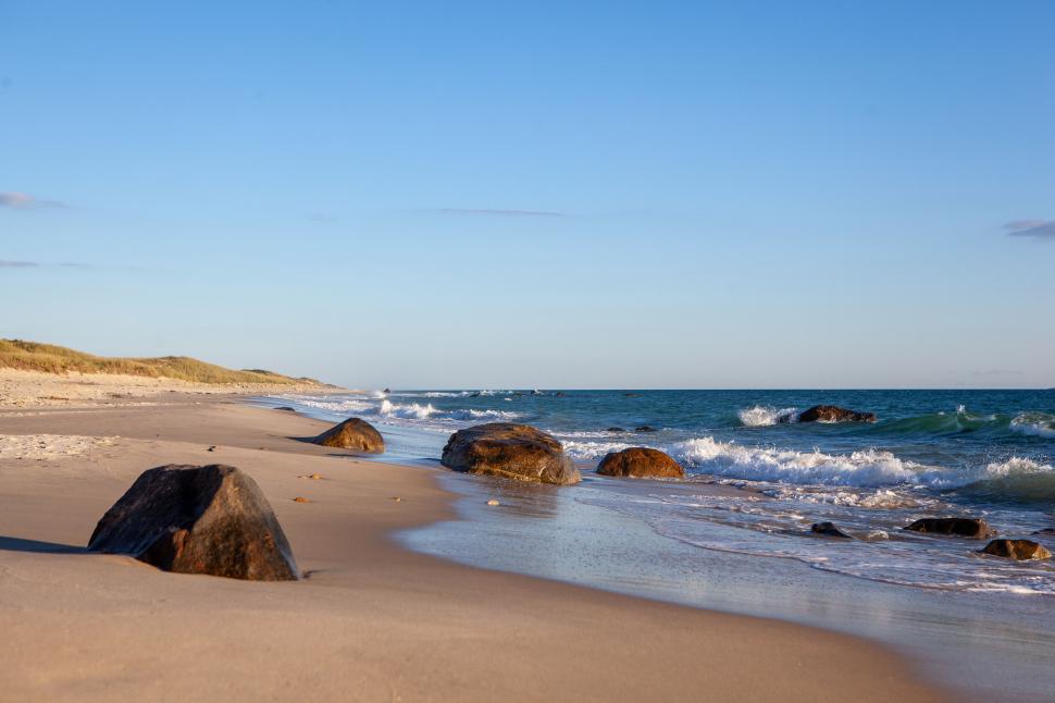 Tranquil coastal rocks and sand