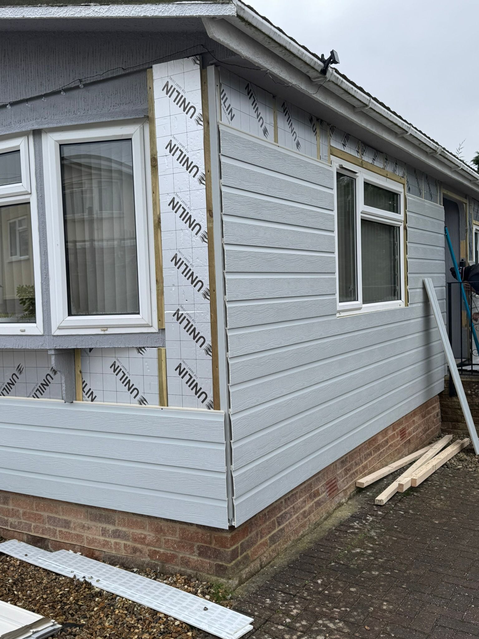 Park home improvement project showing completed exterior work