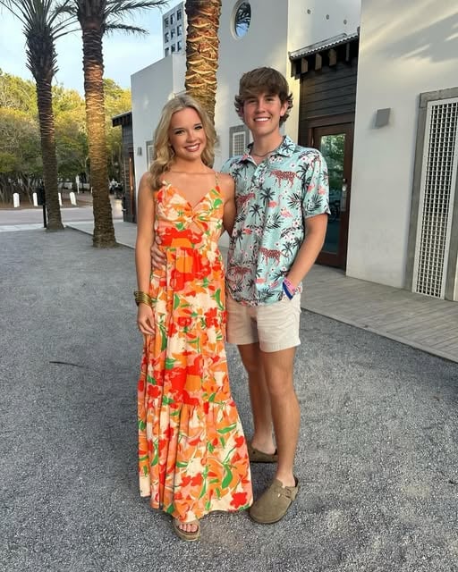 Landon and another adult in formal attire.