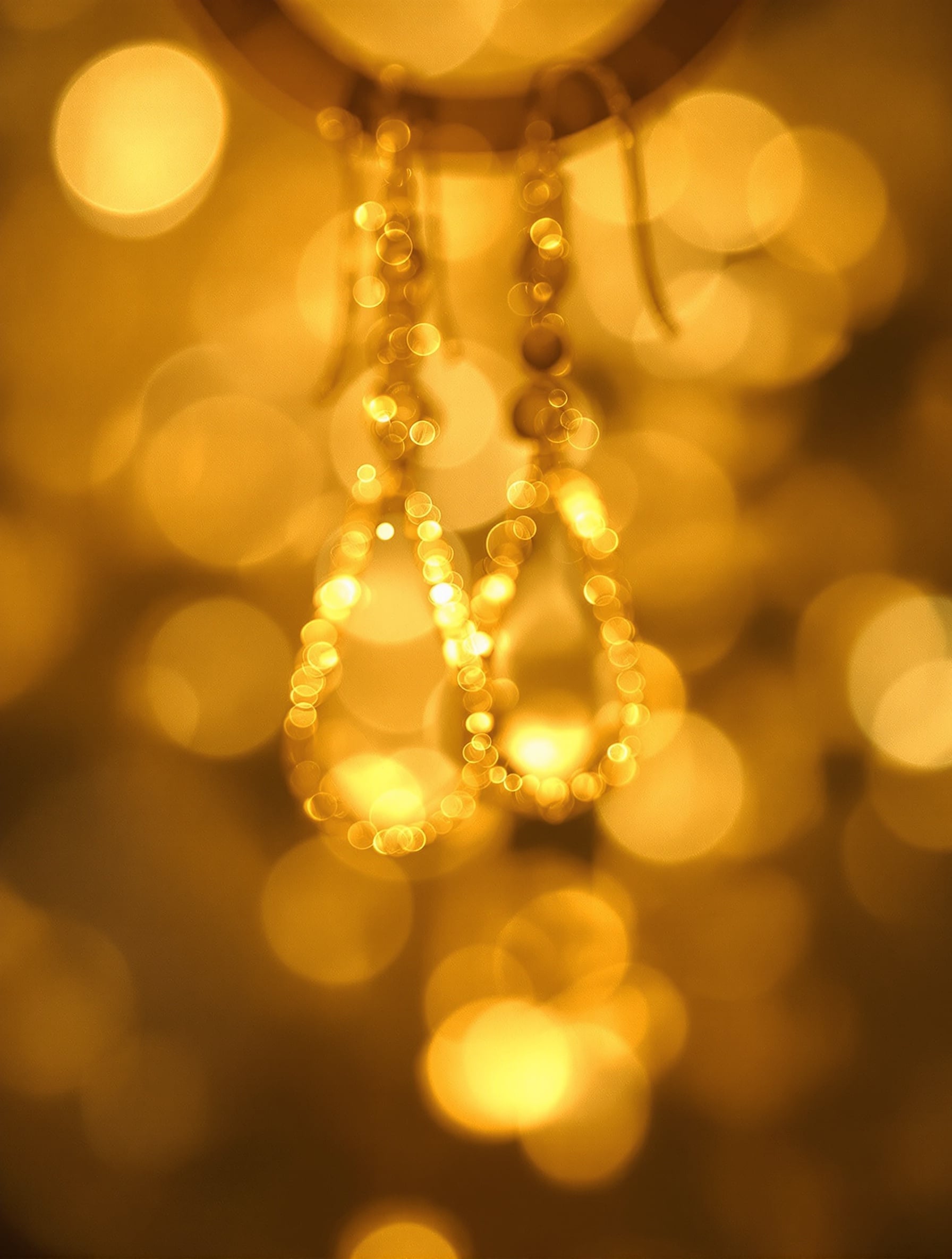 Mystery jewelry silhouette with golden aura glow