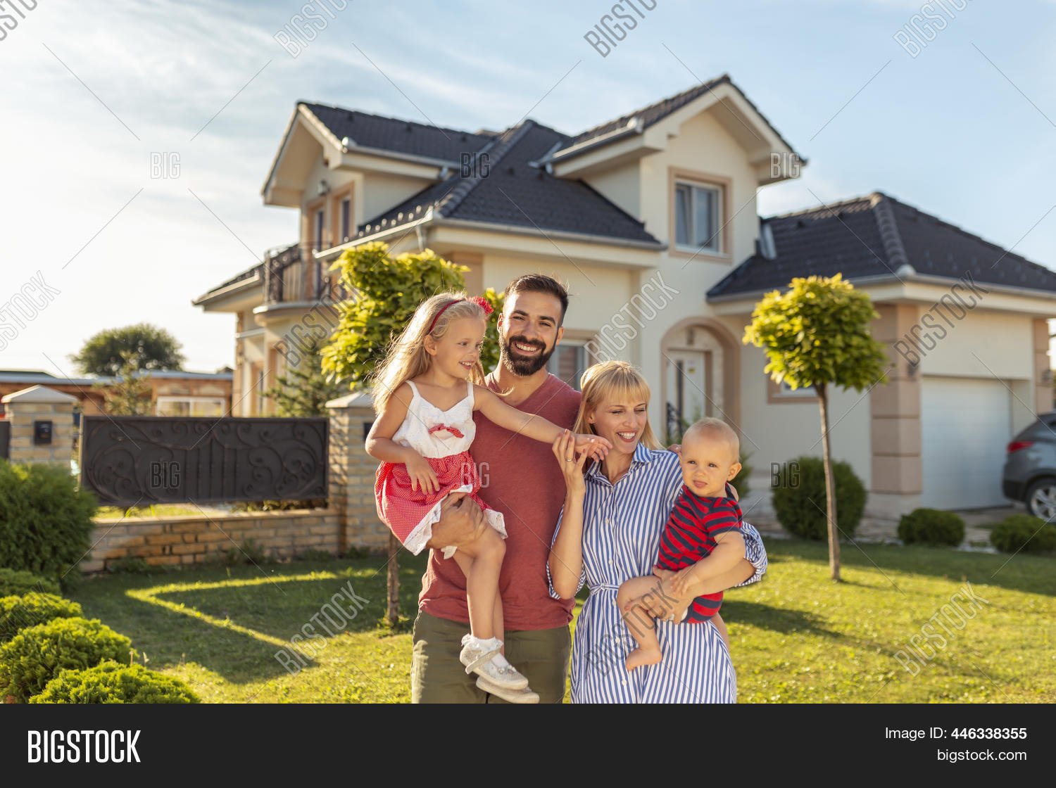 Happy family with new home