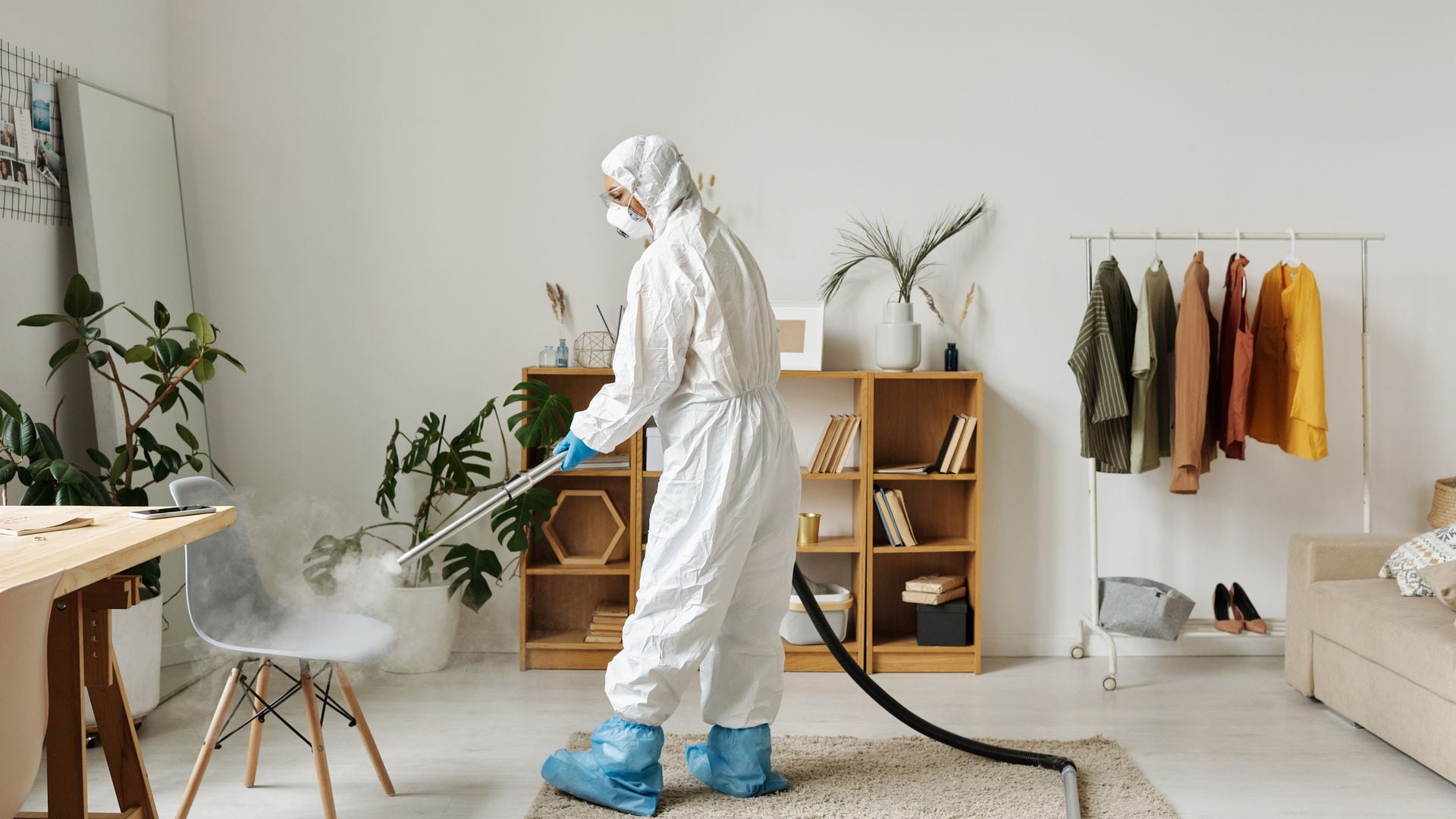 Pest control technician with professional spraying equipment in Bulawayo
