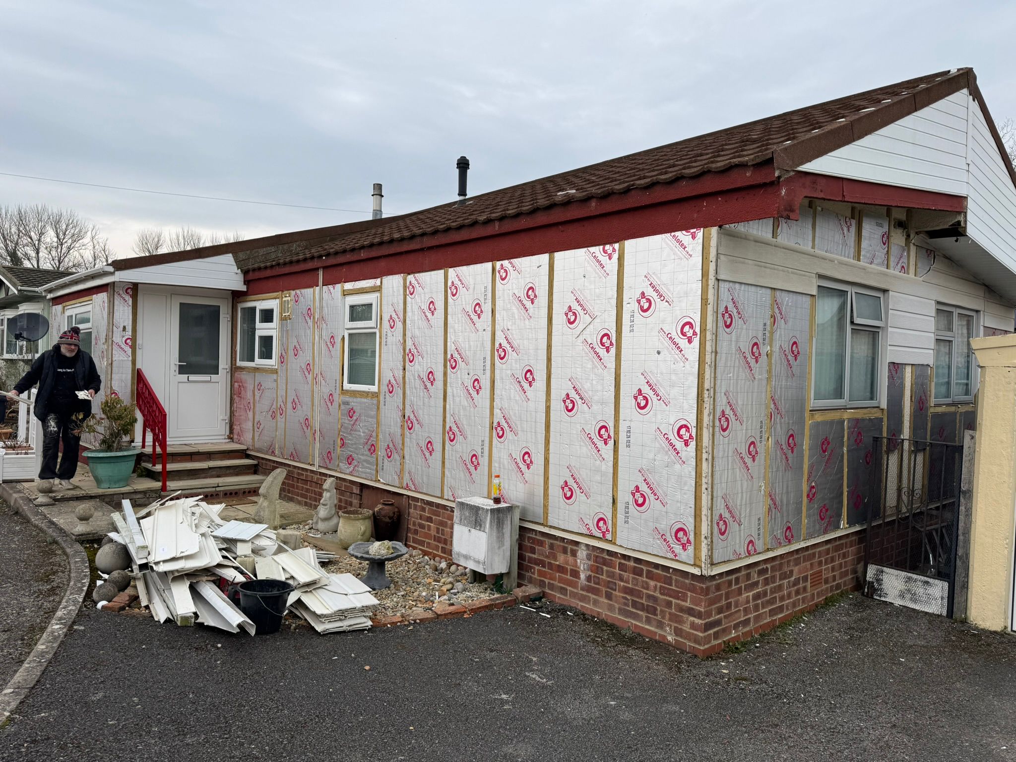 Celotex insulation boards being fitted to park home exterior walls