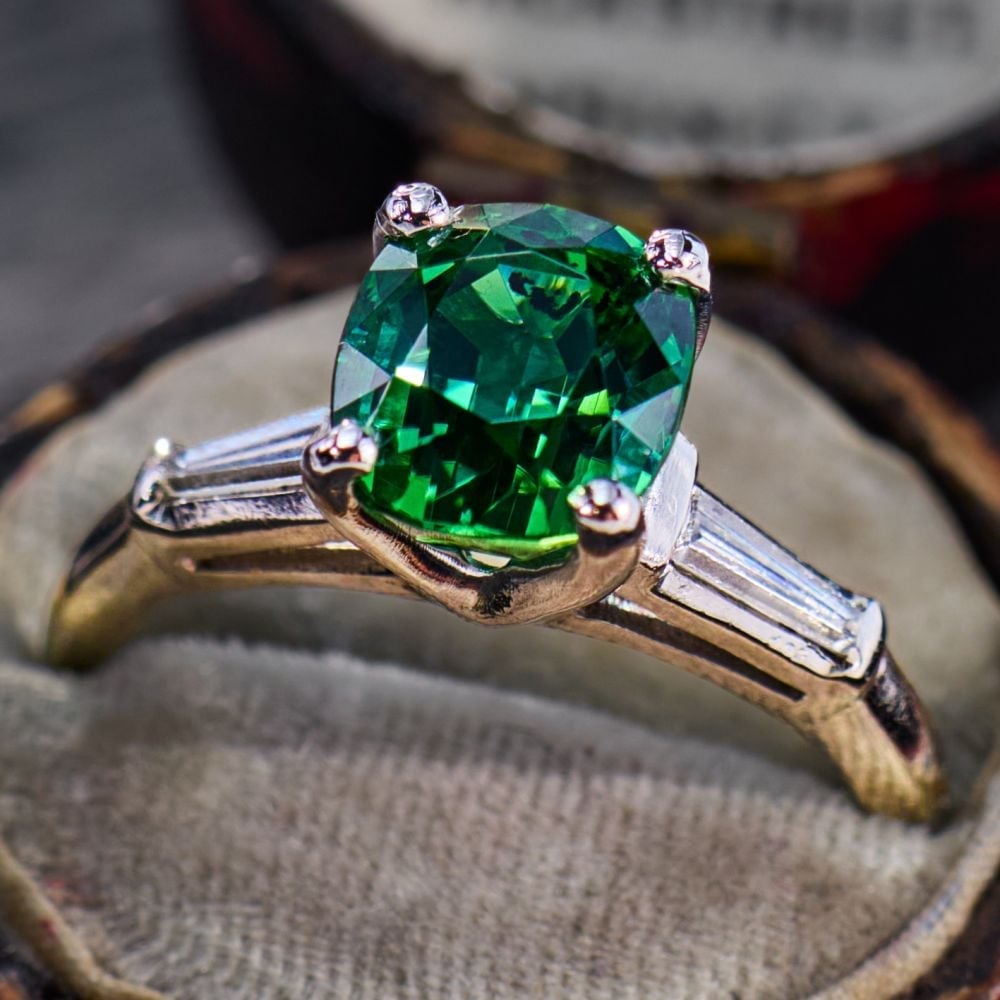 Tourmaline ring showcasing the stone's distinctive color and setting