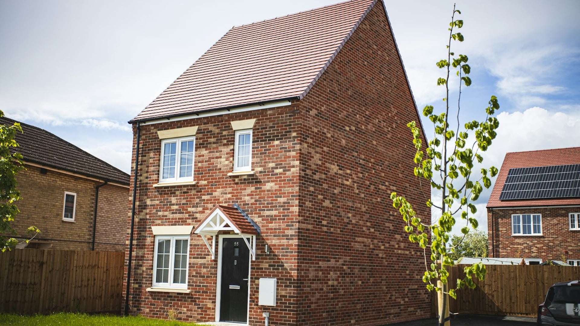 Detached house with new tiled roof