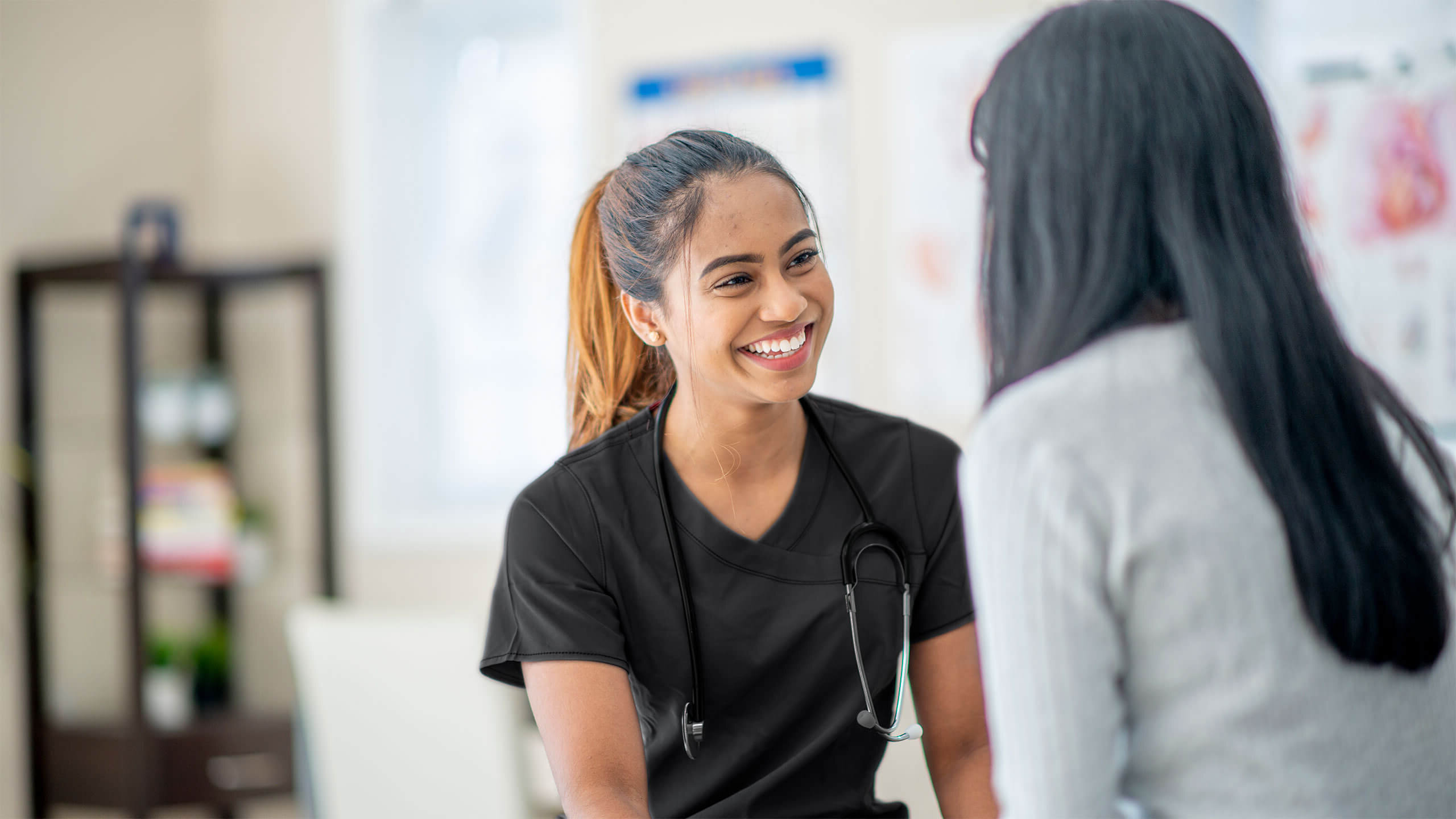 Healthcare professional conducting workplace wellness screening