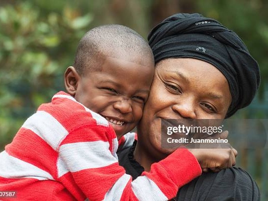 Haitian mother with children smiling