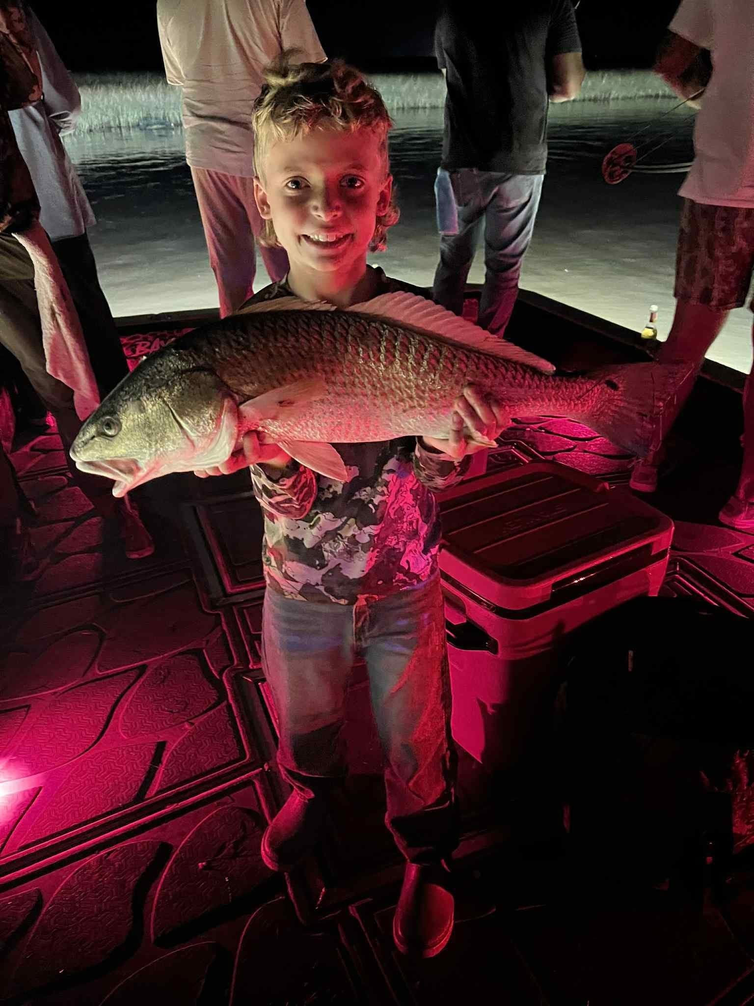 Captain Mark with a big bowfishing catch