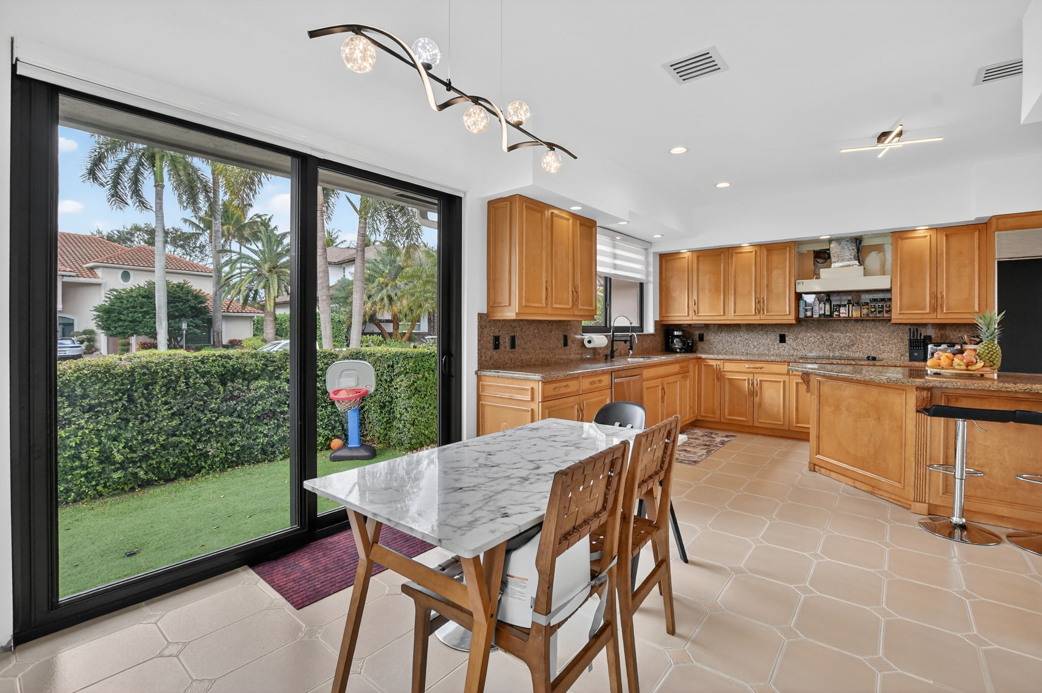 Kitchen dining area with play area view