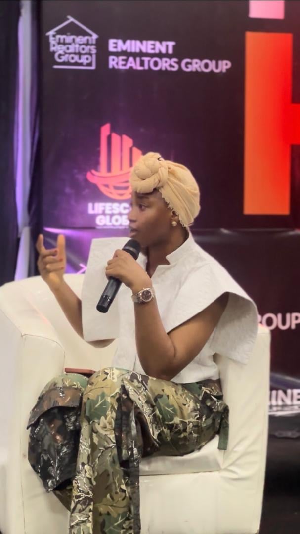 Hawau Temilade speaking at industry conference