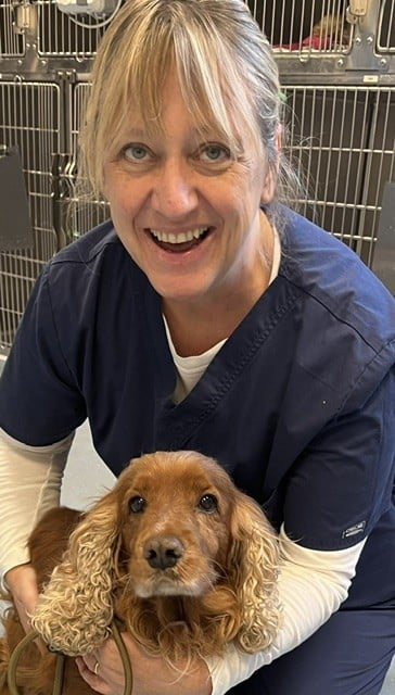 Dr Claudia Moores with a Cocker Spaniel