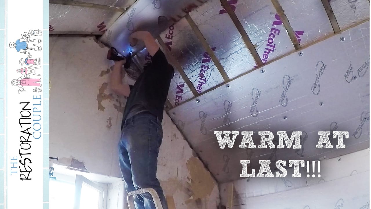 Roof insulation installation in progress