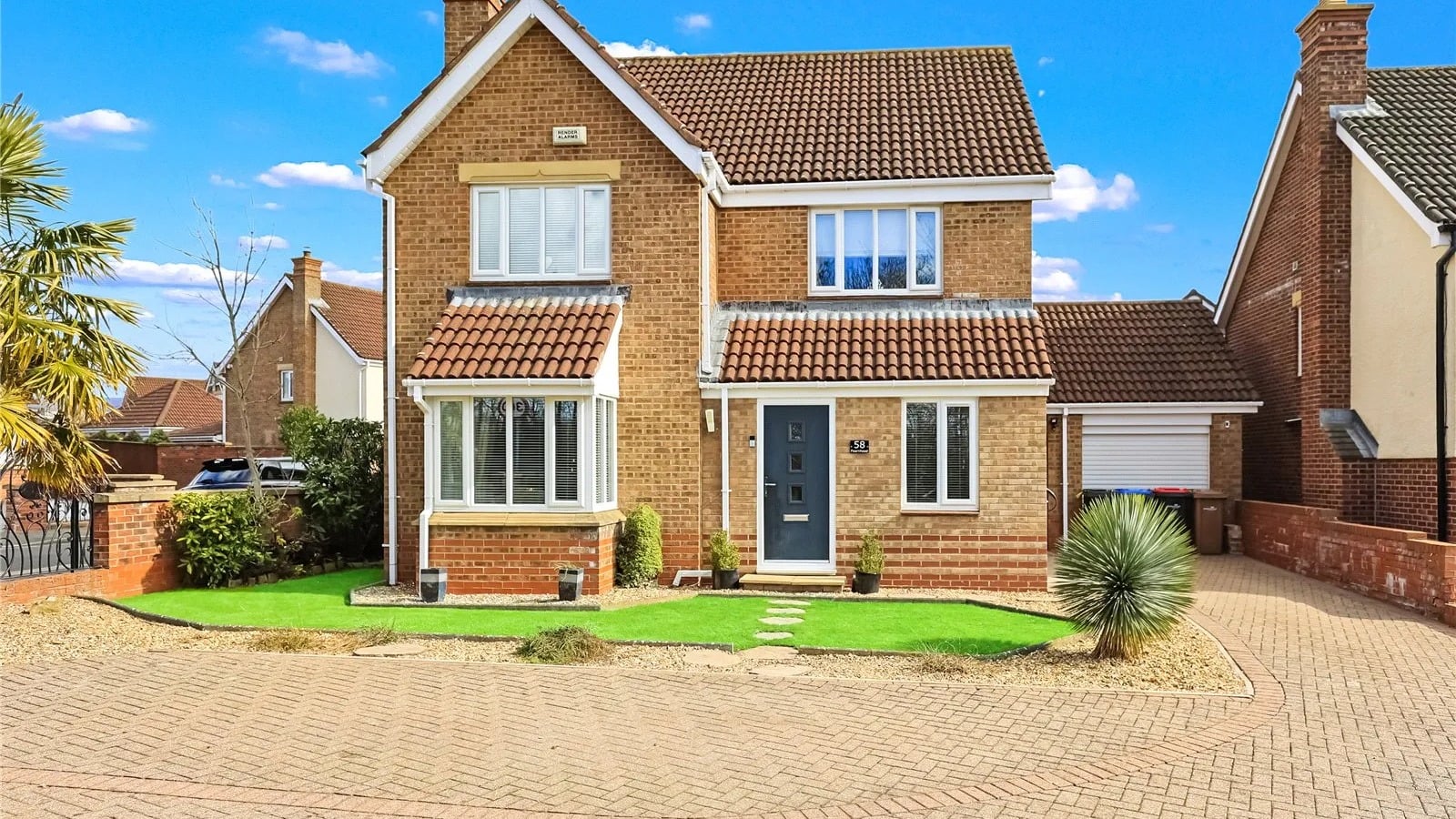 UK detached house with tiled roof