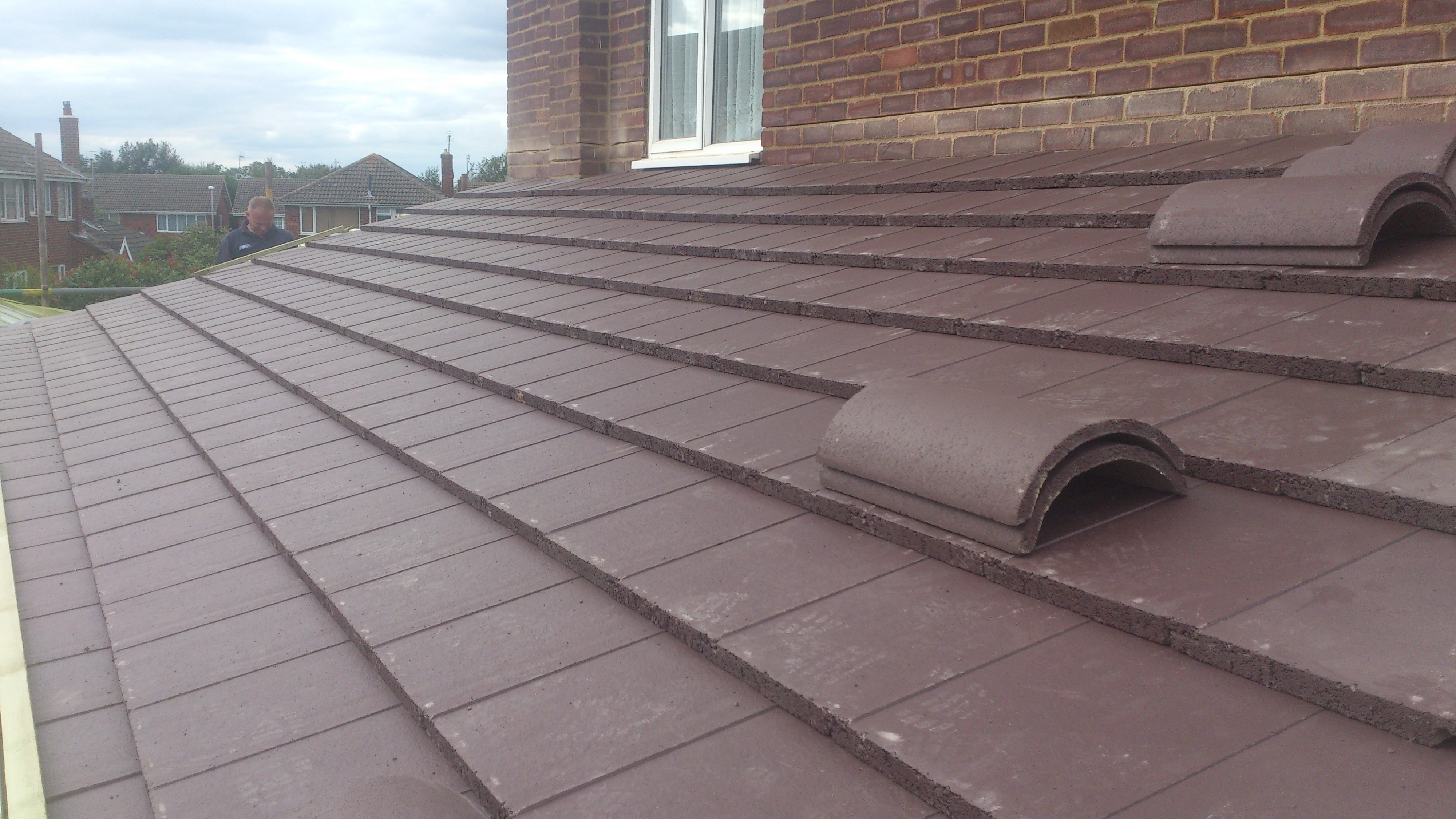 New concrete tile roof on a UK semi-detached house