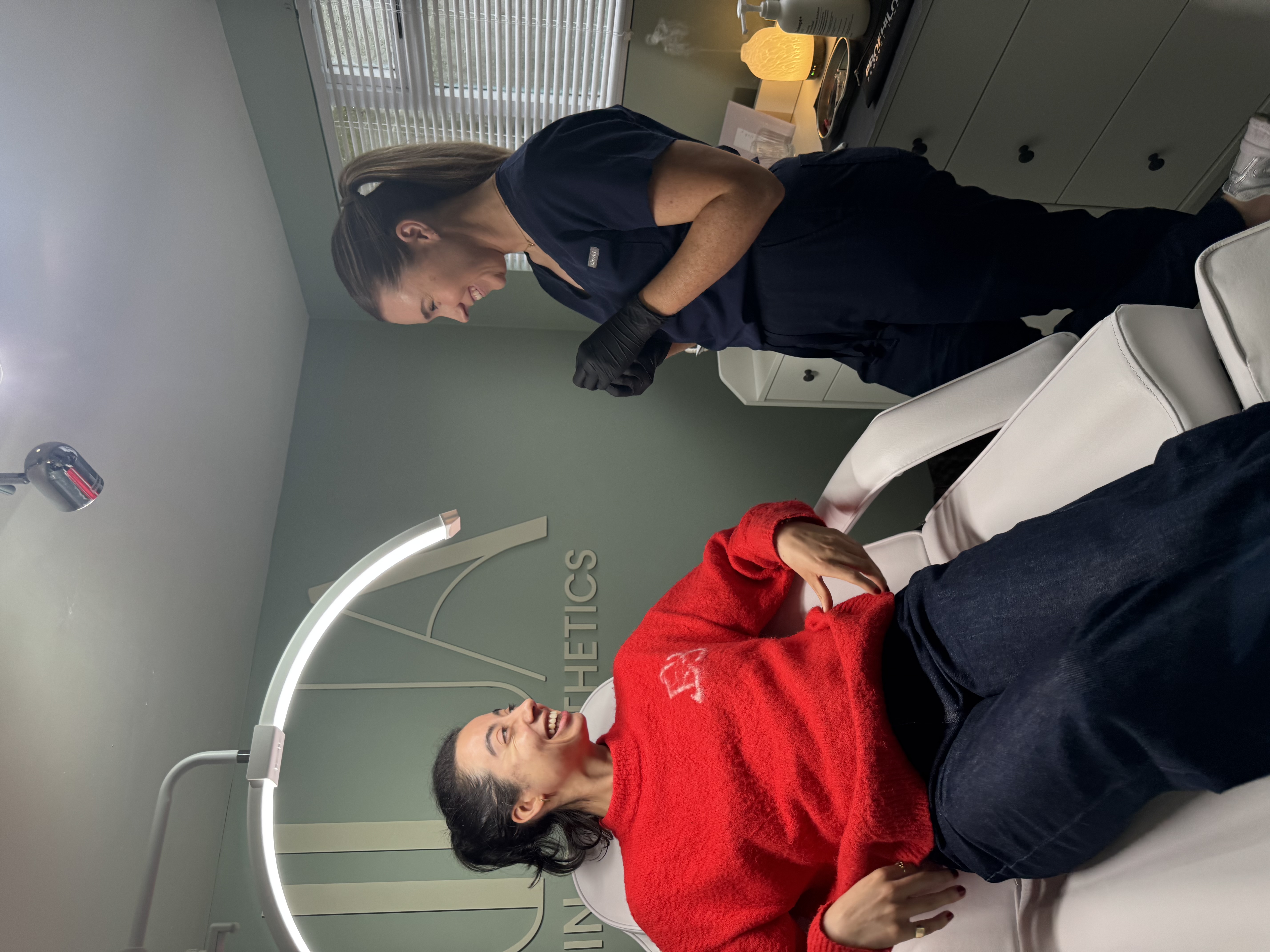 Lauren performing aesthetic treatment