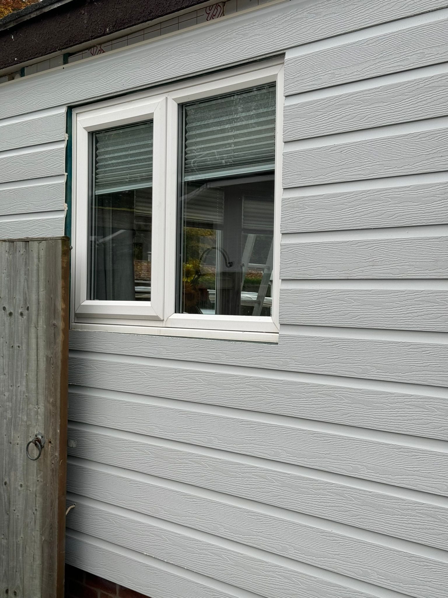 Park home wall stripped back showing original insulation and timber structure