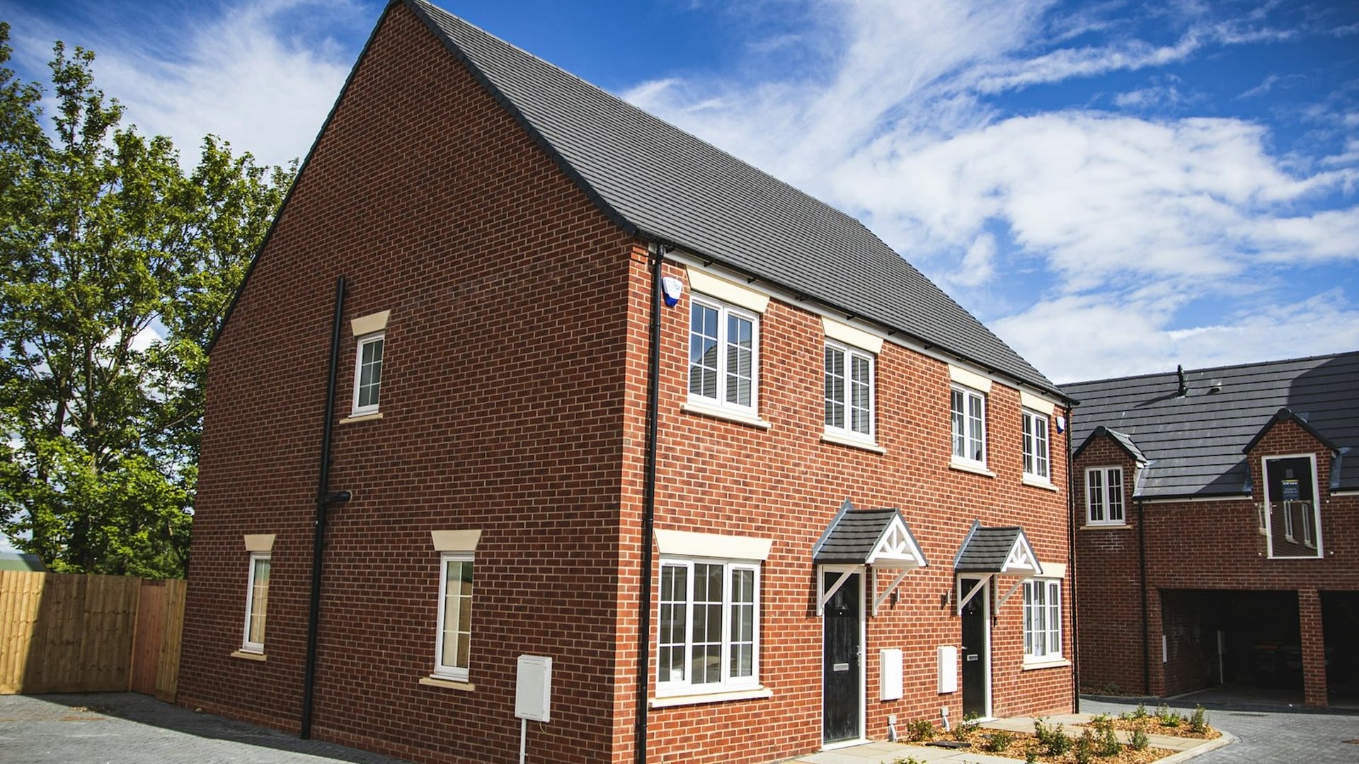 Semi-detached houses with clean roofline
