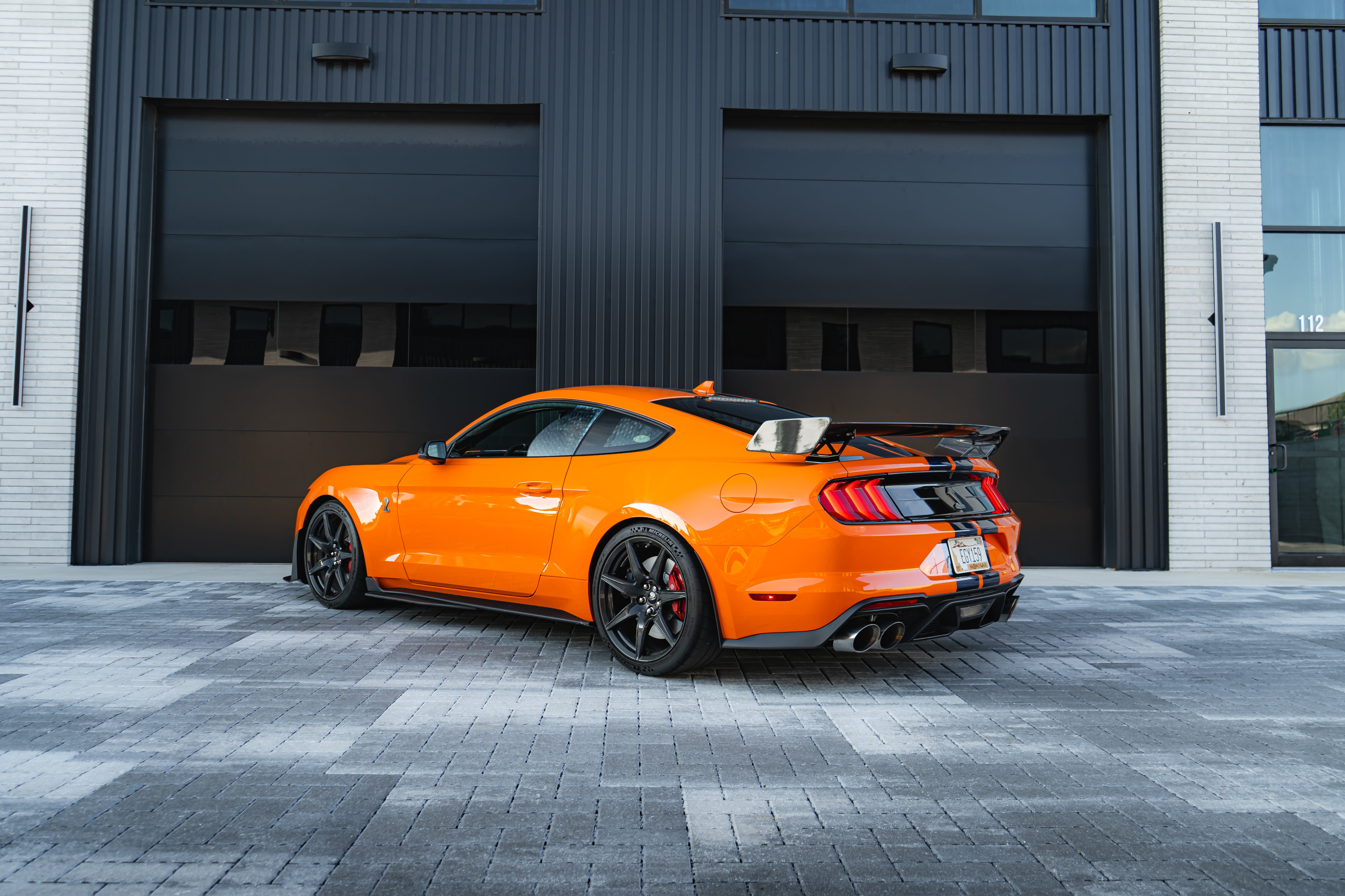 2020 Shelby GT500 rear three-quarter view with carbon fiber wing