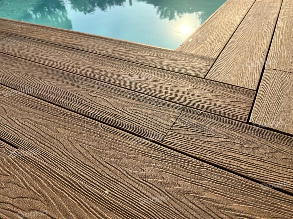 Wood-plastic composite material sample showing dense, uniform texture of sawdust-based WPC decking