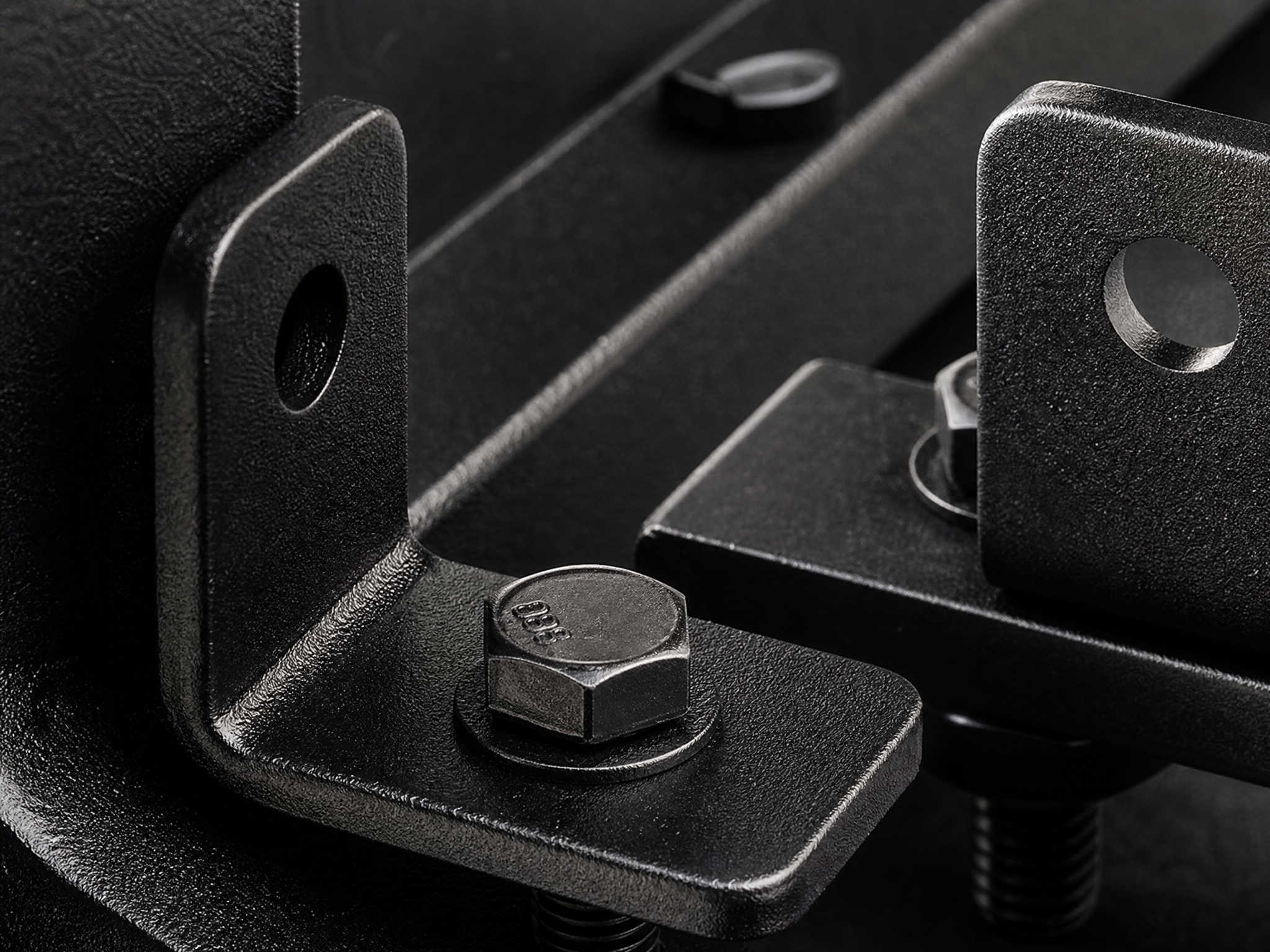 Powder-coated steel brackets close-up