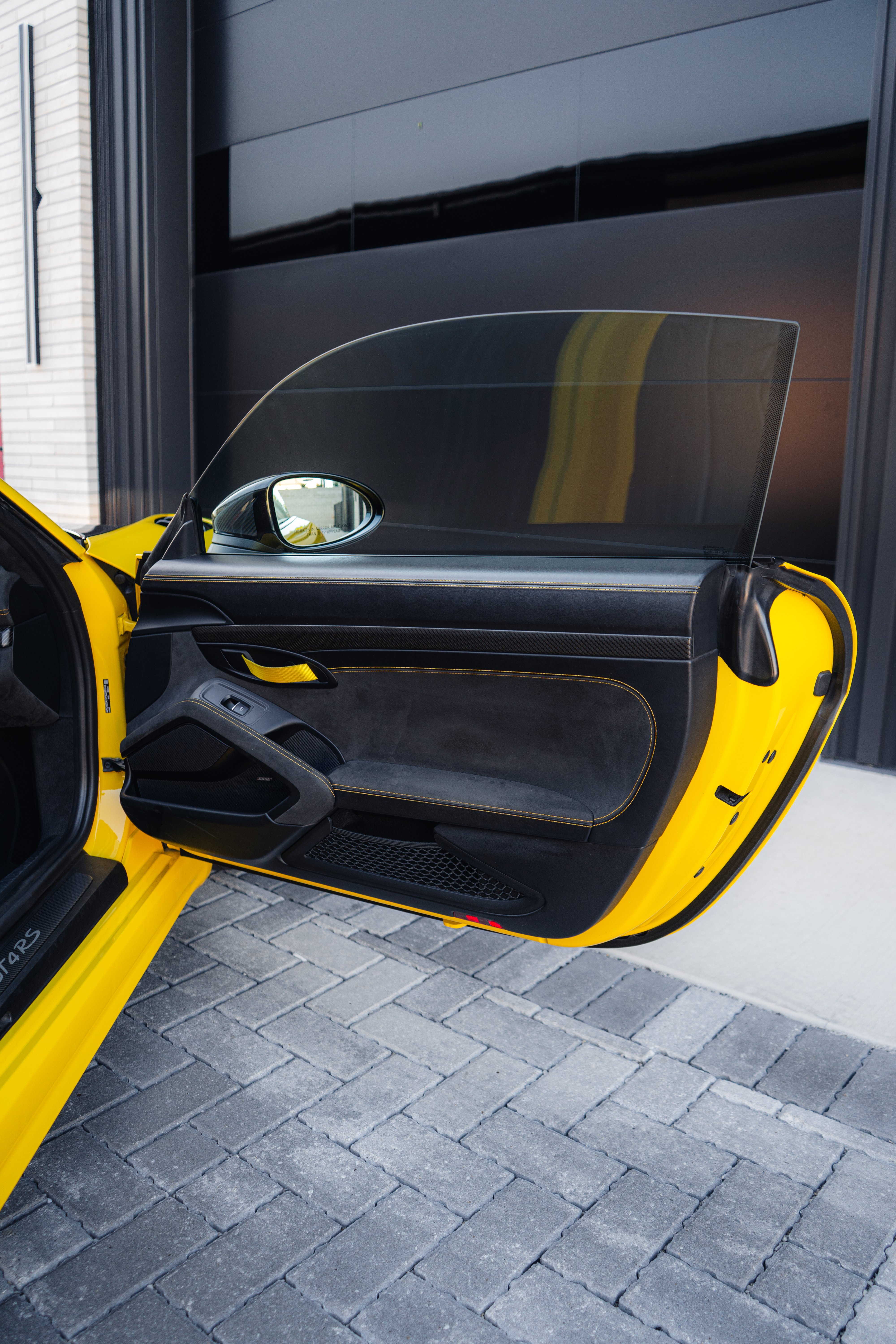 Porsche GT4 RS Alcantara door panel with carbon fiber trim