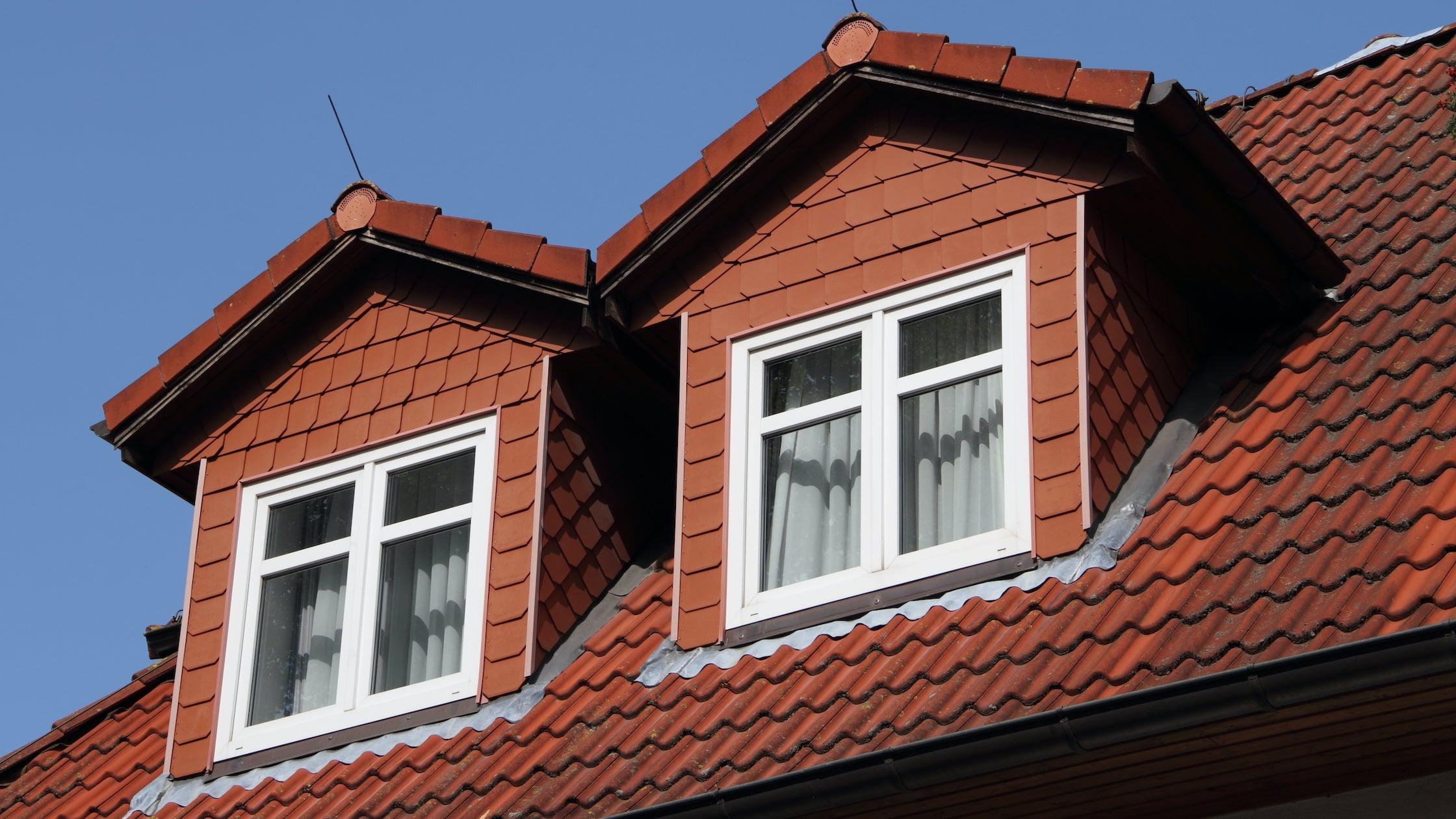 Pitched roof with dormer windows
