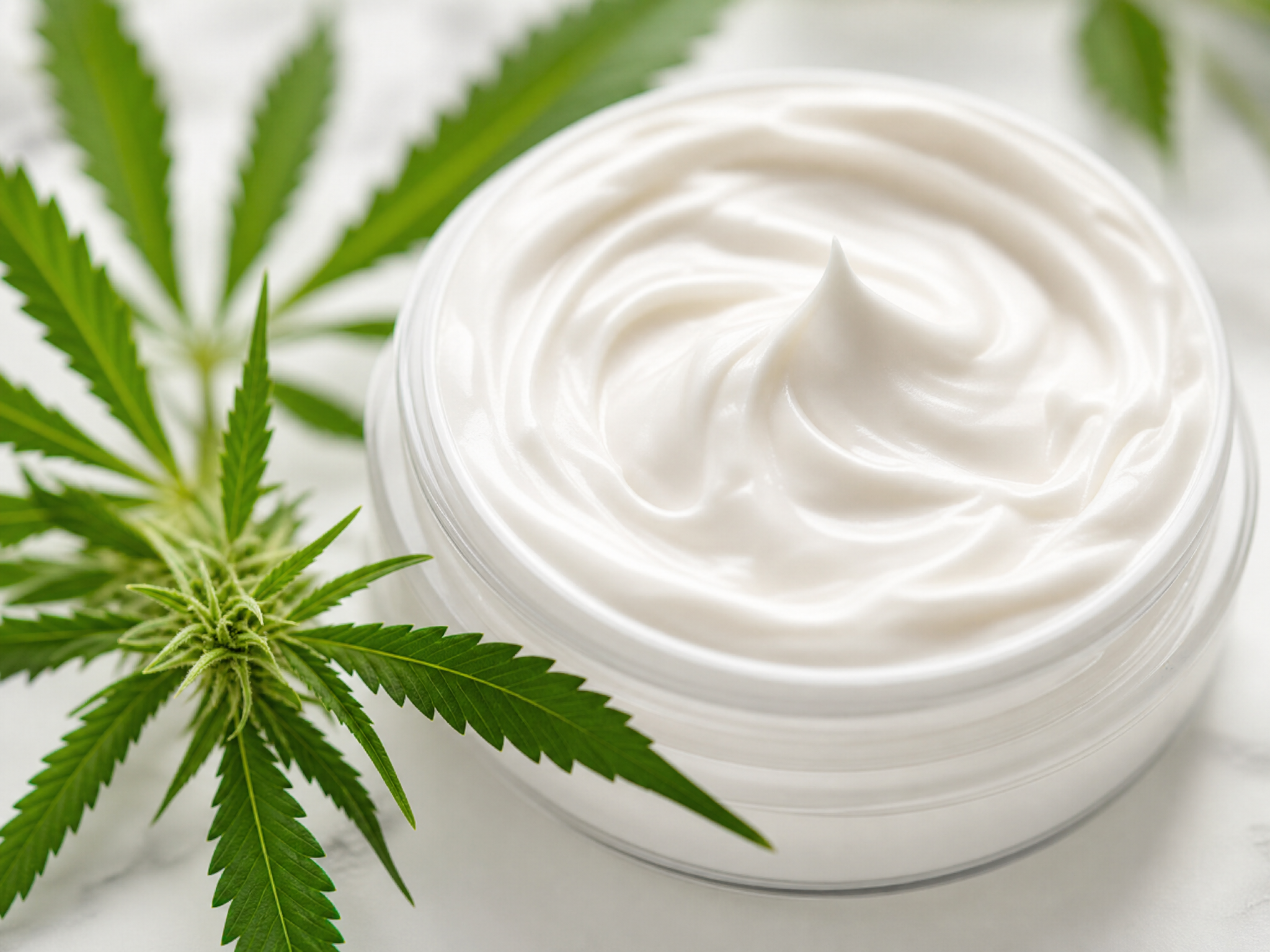 CBD hand cream texture being applied to soft hands - hemp skincare routine