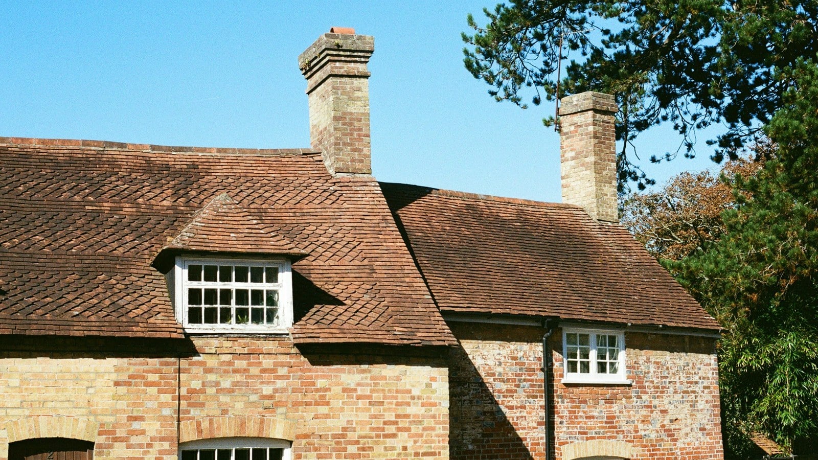 English cottage with clay tile roof