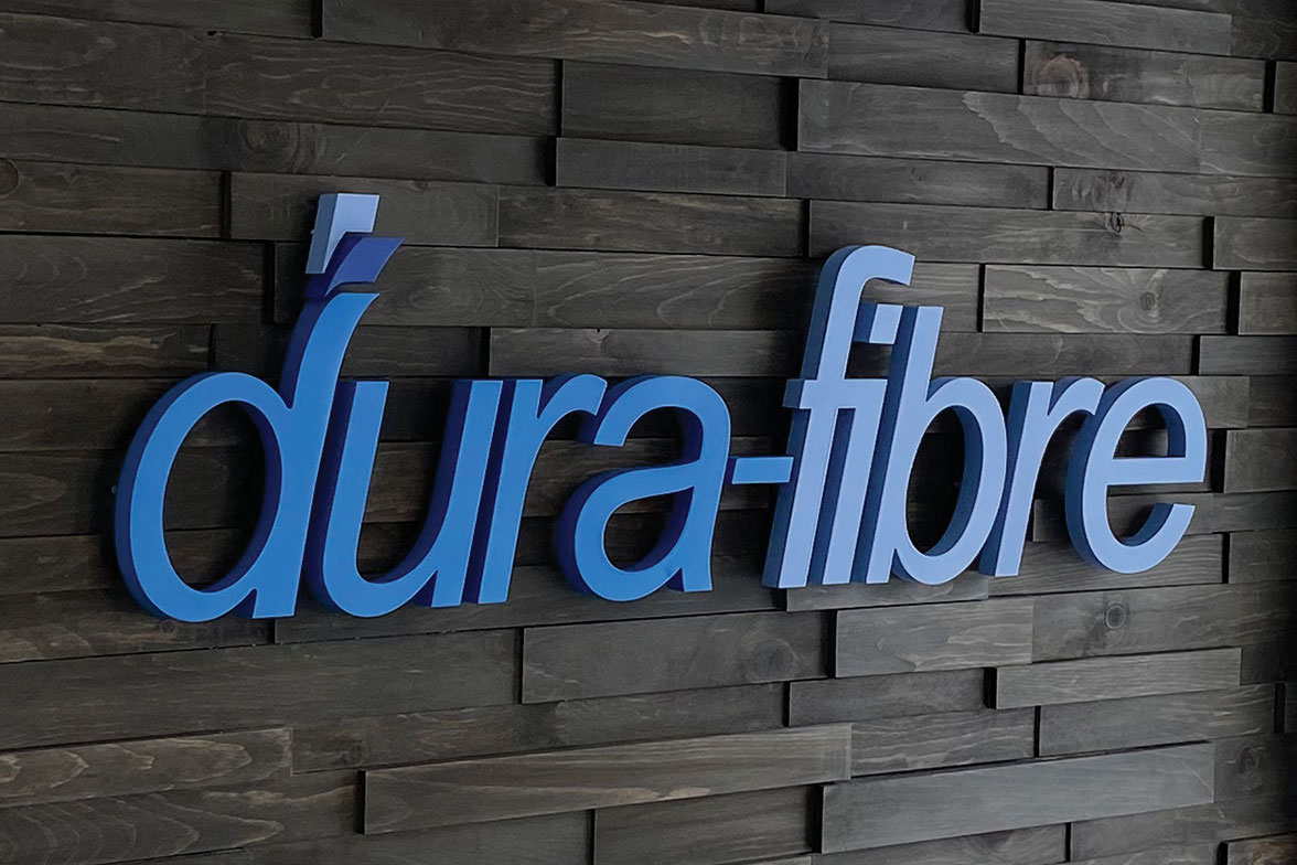 Professional corporate lobby sign with dimensional letters in modern reception area
