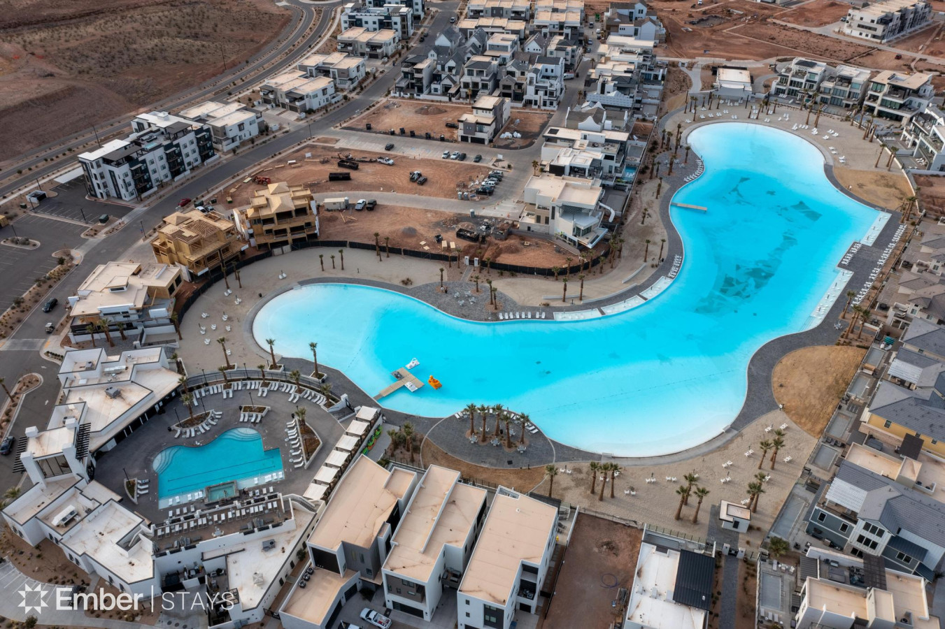 Resort and swimming pool from aerial perspective