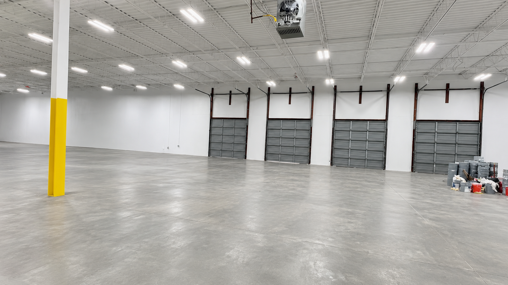 Warehouse interior with drive-in loading dock doors