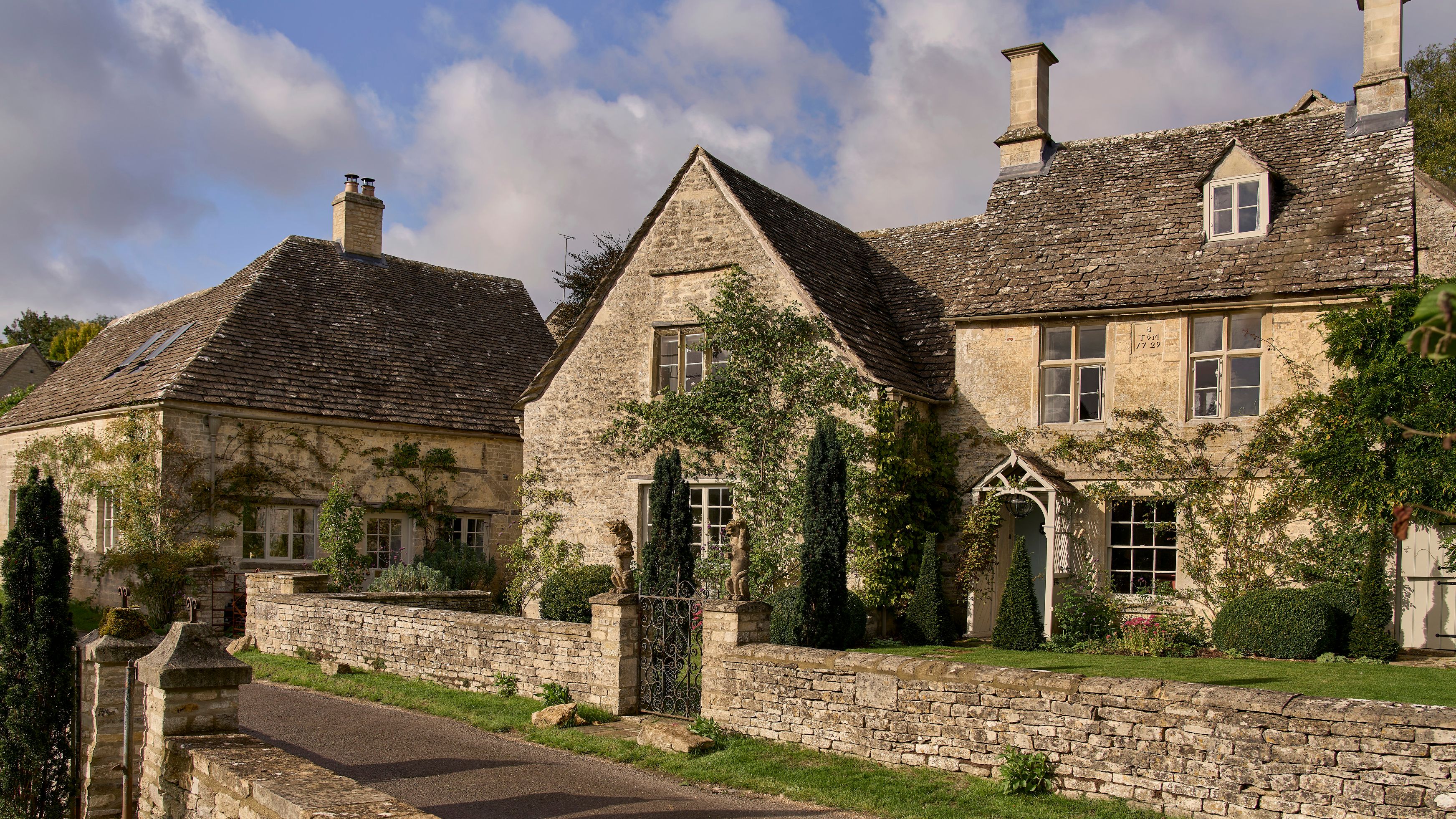 Honey-stone Cotswold house with traditional architecture