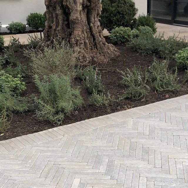 Herringbone block paving driveway in charcoal