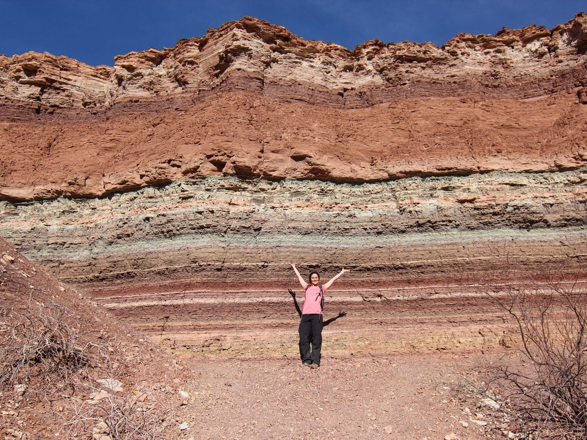 Layered sedimentary rock strata in a canyon wall